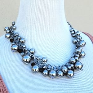 Silvertone balls and black crystals statement necklace